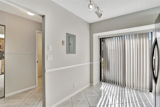 Building Photo - 2 br, 2.5 bath House - 4615 Carambola Cir ...