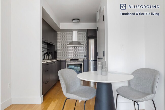 Foto del edificio - 101 E 10th St