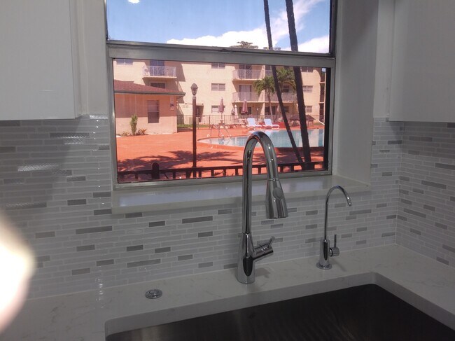 View of the Pool in the kitchen. . - 7505 SW 82nd St