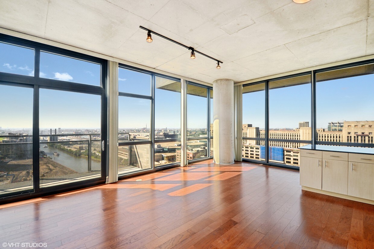 Spacious living room and kitchen - 235 W Van Buren St