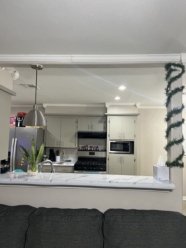 view of kitchen from second living room - 1605 N 26th St