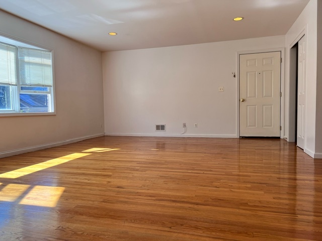 Living Room view from center toward front door - 119 W 35th St