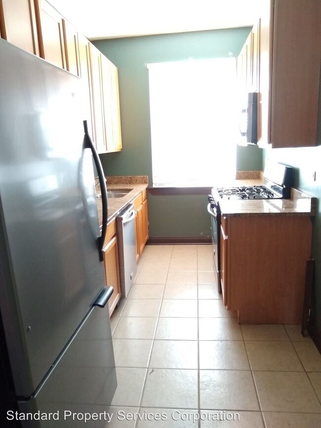 Building Photo - 2 br, 1 bath House - 2131 W Howard St. Unit 3