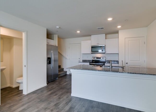 Building Photo - New townhome with attached 2 car garage.