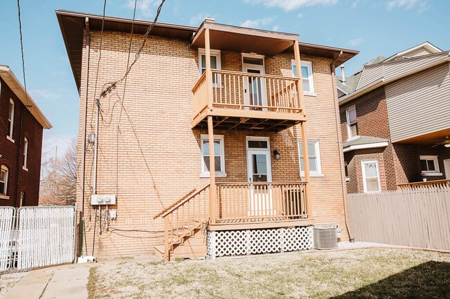 Oversized Private Covered Deck with steps to the shared yard. - 2314 Grand Ave