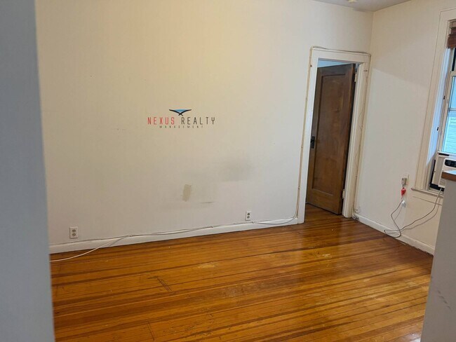 Building Photo - 25-66-66 42nd St