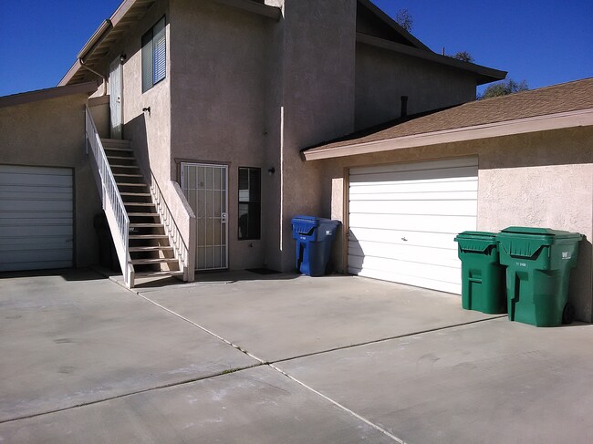 View of the apartment and attached garage - 437 S Sunset St