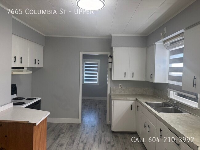Photo du bâtiment - 2 Bedroom Upper Suite