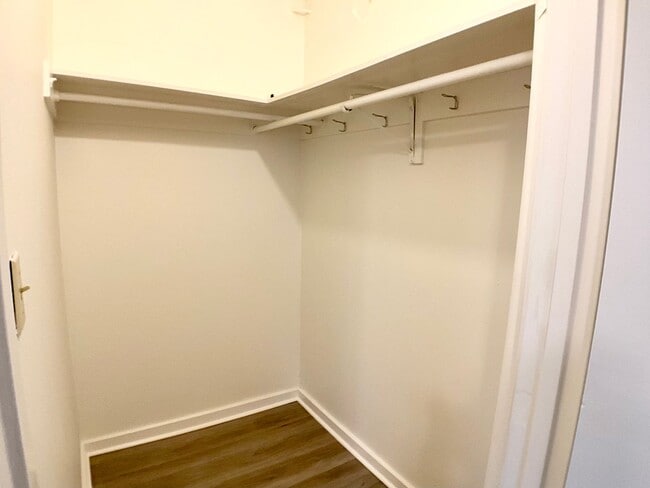 Building Photo - RENOVATED and Private. DISHWASHER, ON-SITE LAUNDRY, HARDWOOD!