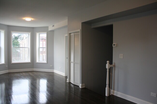 Building Photo - 6433 S Vernon Ave