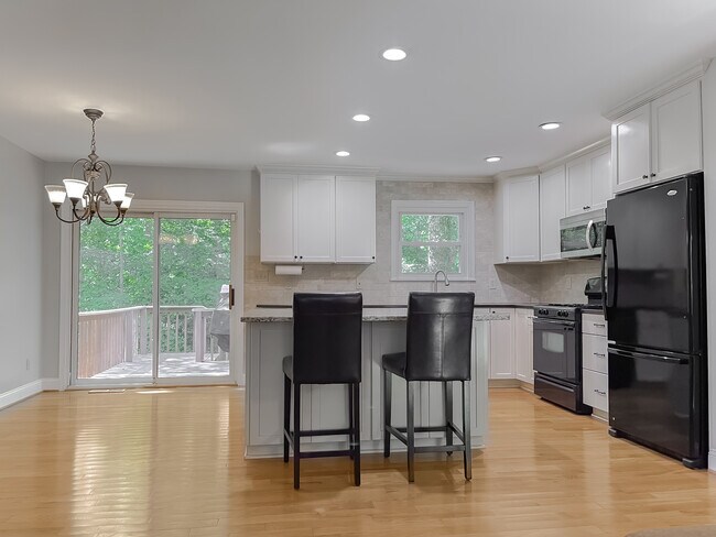 Kitchen View from top of staircase. - 678 Santa Fe Trl