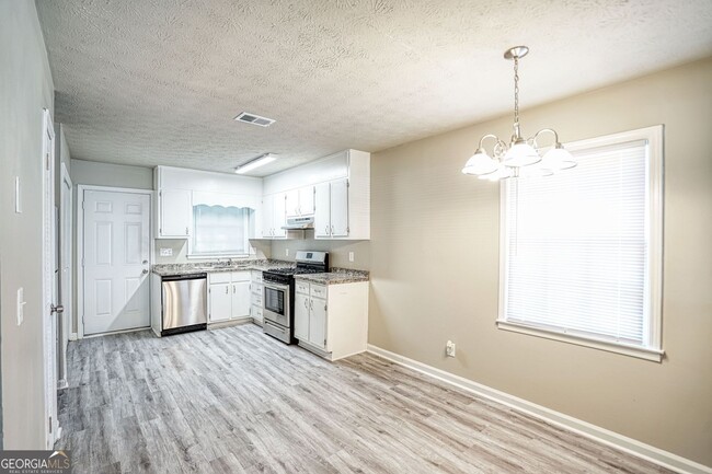 Building Photo - 1516 Pine Cone Ln NW