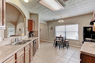 Building Photo - 9211 Hidden Lake E Dr