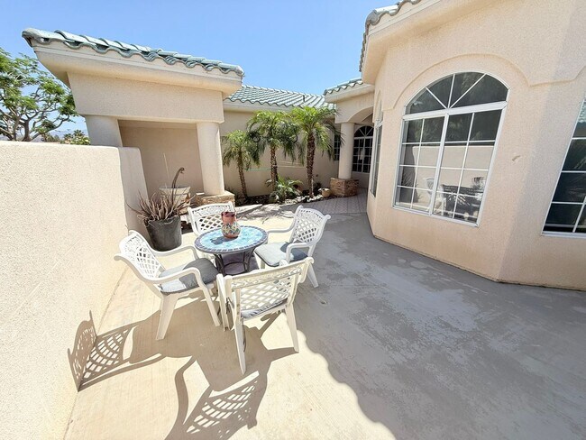 Building Photo - Spacious 4-Bedroom Home with Pool & Spa in...