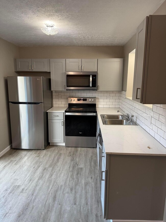 Building Photo - 7806 Barkwood Dr