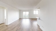 Located at 86 Cedar St in Kitchener, Ontario, this thoughtfully designed one-bedroom, one-bathroom unit offers a clean, modern aesthetic throughout. Light-toned laminate hardwood flooring flows seamlessly across the entire space, complementing the bright white walls and creating a cohesive, contemporary feel.

The open-concept living room is generously sized, bathed in natural light from large windows and a sliding glass door that leads to an outdoor balcony, offering views of the surrounding cityscape. A convenient pass-through counter connects the living area to the kitchen, enhancing the open flow of the space.

The galley-style kitchen is efficiently laid out and well-equipped with stainless steel appliances, including a full-size refrigerator and dishwasher, white shaker cabinetry, a stainless steel sink, and classic white subway tile backsplash with dark grout accents.

The bedroom is a comfortable, well-proportioned room featuring a large sliding-door closet, a window with outdoor views, and the same warm laminate flooring found throughout.

The bathroom is finished with floor-to-ceiling white subway tile surrounding a full soaker tub and shower combination, lending a clean and timeless look. A welcoming hallway connects all areas of the unit, completing this practical and stylish home.
