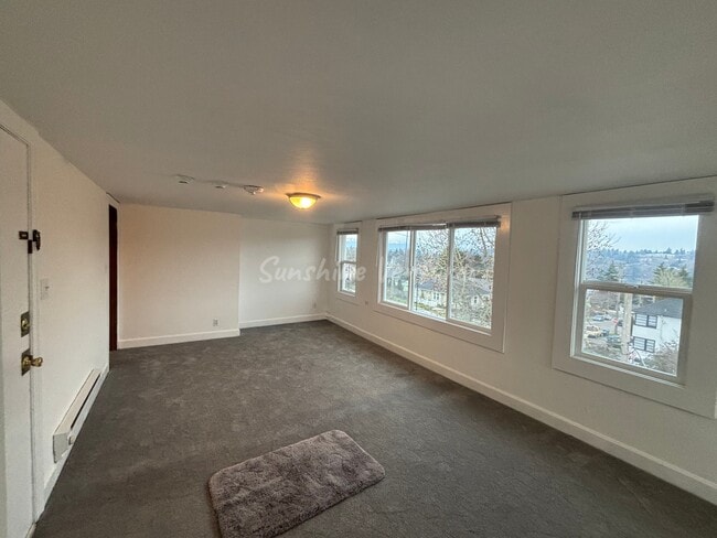 8 Living Room from Kitchen - The Highland at 936