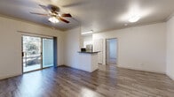 Located in the Stone Oak area of San Antonio, TX, this well-appointed one-bedroom, one-bathroom residence offers a thoughtfully designed single-floor layout. The open-concept living and dining area is finished with warm wood-style flooring and accented by crown molding and a ceiling fan, creating a bright and welcoming atmosphere. Sliding glass doors lead to a private balcony, filling the space with natural light. The kitchen is a standout feature, showcasing white shaker cabinetry, dark granite countertops, a bold subway tile backsplash, and stainless steel appliances including a range, dishwasher, and refrigerator. A dedicated pantry and breakfast bar add both style and practicality. The spacious bedroom is carpeted for comfort, featuring a ceiling fan, large windows with garden views, and access to generous closet space with built-in wire shelving across four closets. The bathroom impresses with dual vessel sinks set on granite countertops and a large mirror, complemented by in-unit laundry. A dedicated office and hallway round out the functional layout, making this residence as practical as it is comfortable.