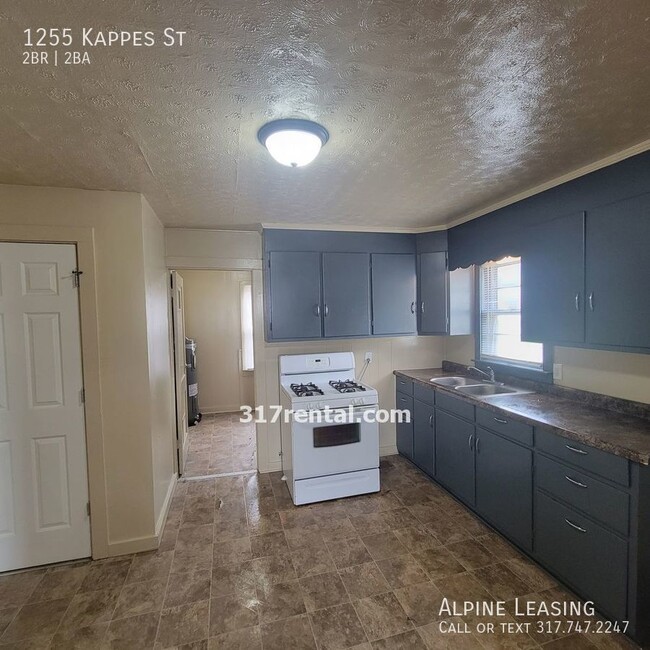 Building Photo - West Indy 2BR/2BA House w/Garage!