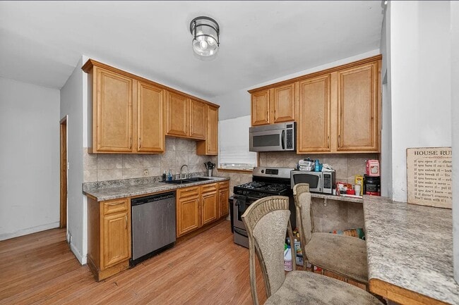 Building Photo - 7733 S Luella Ave