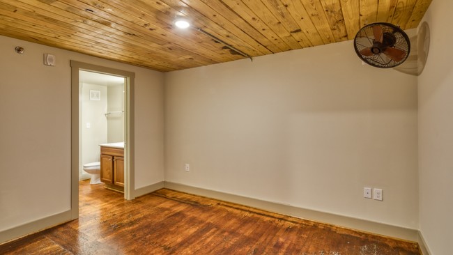 Gorgeous knotty pine enchants select homes. - Lofts at Sterling Mill