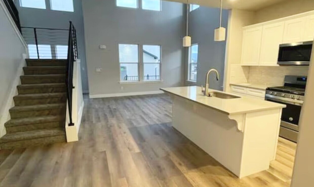 Primary Photo - Spacious 3-Bedroom End-Unit Townhome in He...