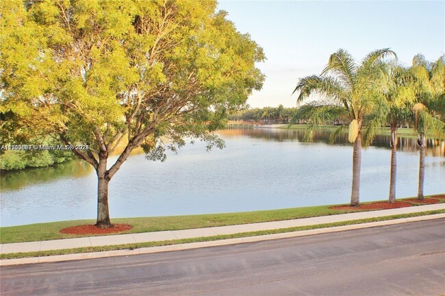 walking area with lake view - 2493 Centergate Dr