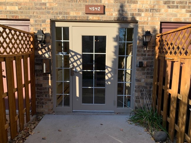 Key fob entry. Building feels very safe and secure away from busy streets. - 4542 Cedar Lake Rd S