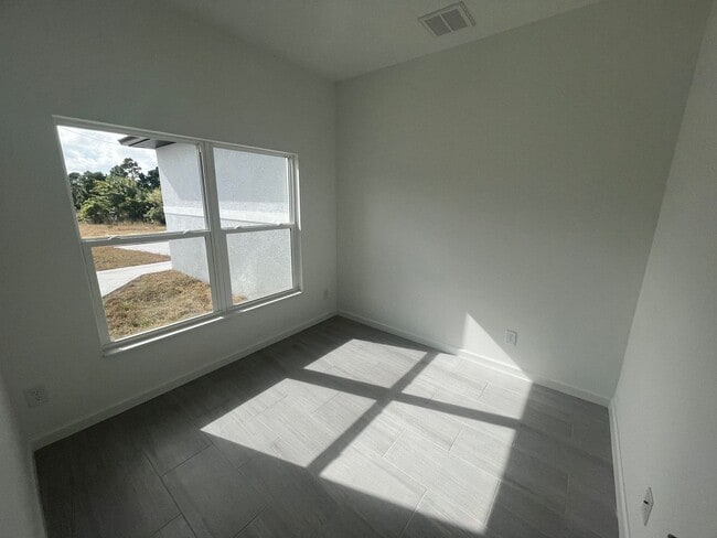 Building Photo - Brand-New 4 Bed, 2 Bath Home with 2-Car Garage – SW Lehigh Acres