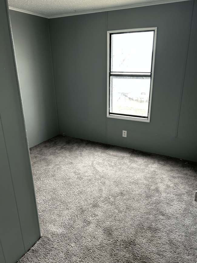 Building Photo - 7601 N Hwy Vv