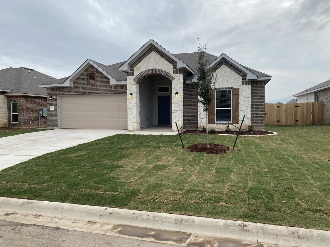 Front Facade. - 10231 Six Shooter Ln