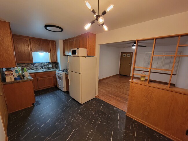 Kitchen, dining, living room. - 9405 NE 13th St