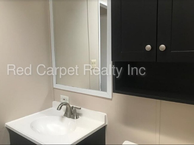 Building Photo - 2943 Trace - gated mobile home community!