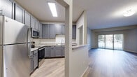 This well-appointed 2-bedroom, 2-bathroom residence in Burnsville, Minnesota offers a thoughtfully designed single-floor layout with a range of modern updates throughout. The kitchen is a standout feature, showcasing grey shaker-style cabinetry, a white subway tile backsplash, light stone countertops, and a full suite of stainless steel appliances including a refrigerator, range, microwave, and dishwasher. A breakfast bar with a pass-through opening connects the kitchen to the rest of the living space, enhancing the open feel. The living room is bright and airy, featuring wood-style flooring and sliding glass doors that lead directly to a private patio, allowing for abundant natural light and outdoor views. The spacious primary bedroom features plush carpeting, a tray ceiling detail, a large window, and generous closet space. The second bedroom is similarly carpeted and well-proportioned. Both bathrooms are finished with white tile flooring and include tub/shower combinations. Additional conveniences include three closets for ample storage, a dedicated laundry area, and wood-style flooring throughout the main living areas. Neutral tones and clean finishes create a cohesive and move-in-ready atmosphere throughout the home.