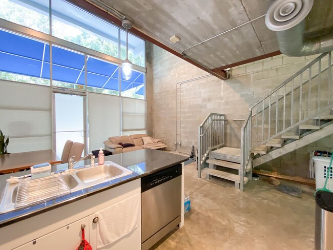 Building Photo - Pet Friendly! Lofts Oasis #105