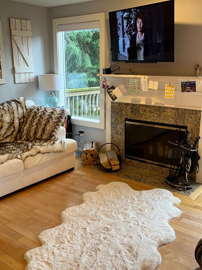 Living Room and Fireplace - 301 W Raye St
