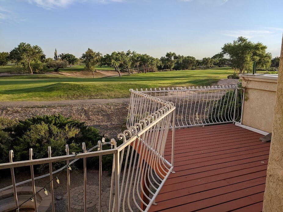 Large deck facing out to the golf course. - 6424 Saint Josephs Ave NW