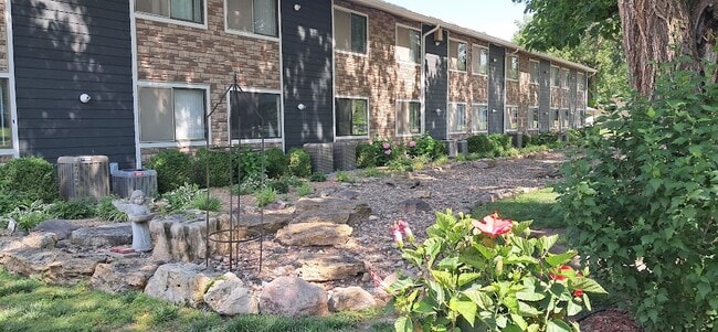 Flowers are blooming here at our property along the river rock bed - Indian Guide Terrace