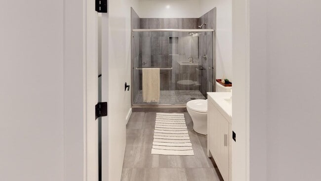 Photo - Furnished Bedroom in NOPA Apartment