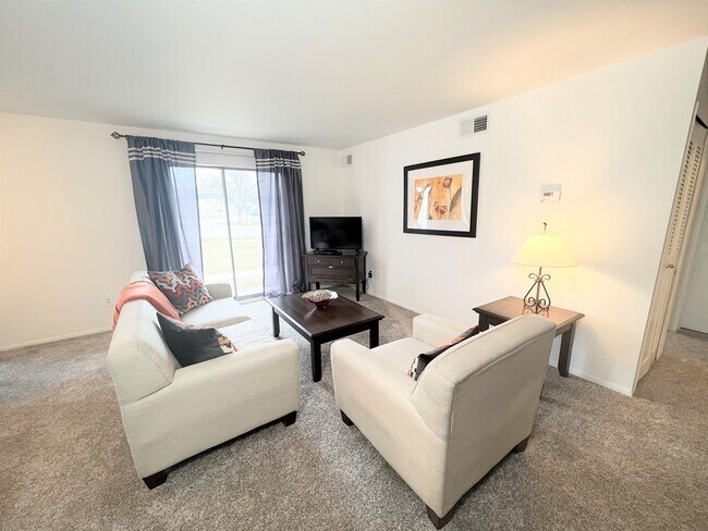 2 Bedroom Living Room - Williamsburg Square Apartments