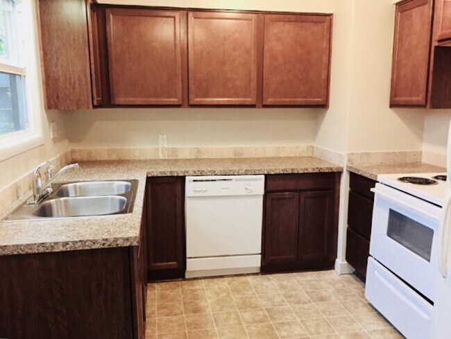 Building Photo - CHARMING & UPDATED; ONE LEVEL, HUGE FENCED...