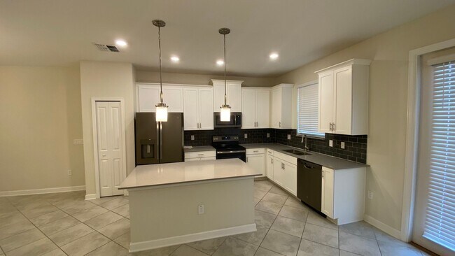 Building Photo - 3 Bedroom, 2.5 Bath Townhome in Lake Nona - Priced to Rent!