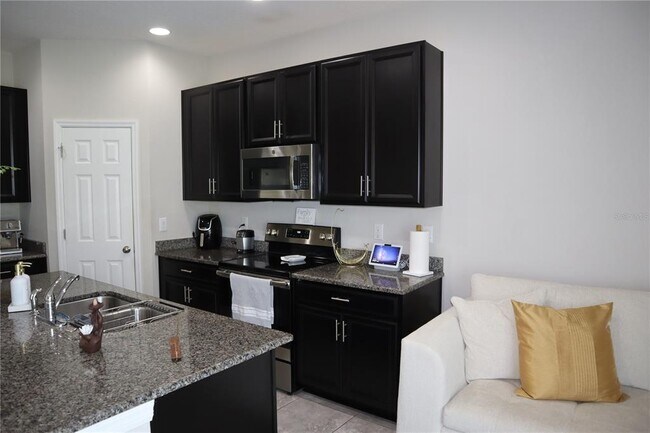 Foto del edificio - 7022 Grand Elm Dr