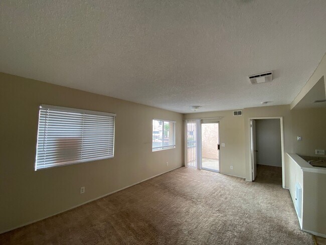 Building Photo - 2 BR 2 BA 1 Story Condo w/Balcony W/D Gate...