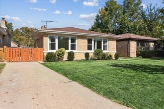 Building Photo - 3836 W Estes Ave
