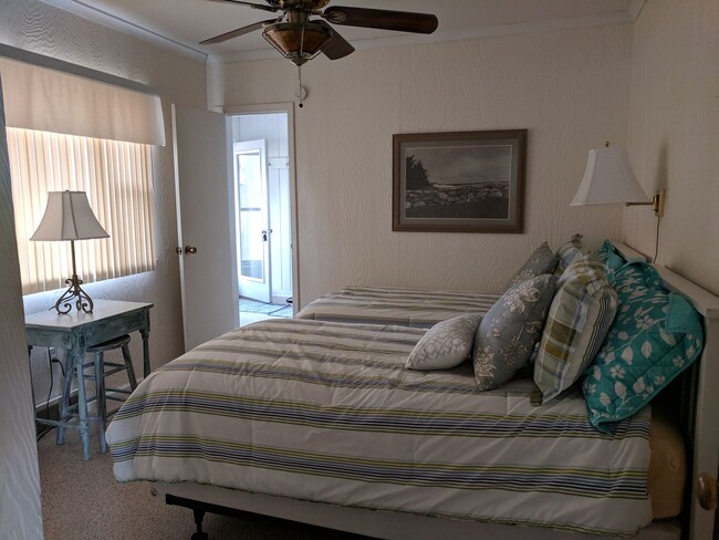 Building Photo - Fully furnished 2 bed home across from pub...