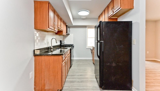 Building Photo - Spacious and Convenient 2-Bedroom Condo in...