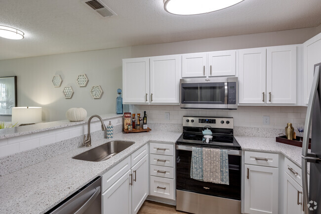 Kitchen view from entry. - Seaside Grove Apartments