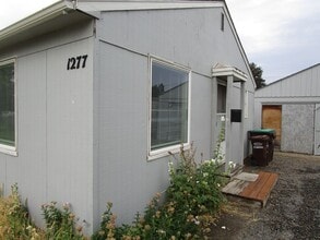 Building Photo - 1275-1277 NE McRae Ct