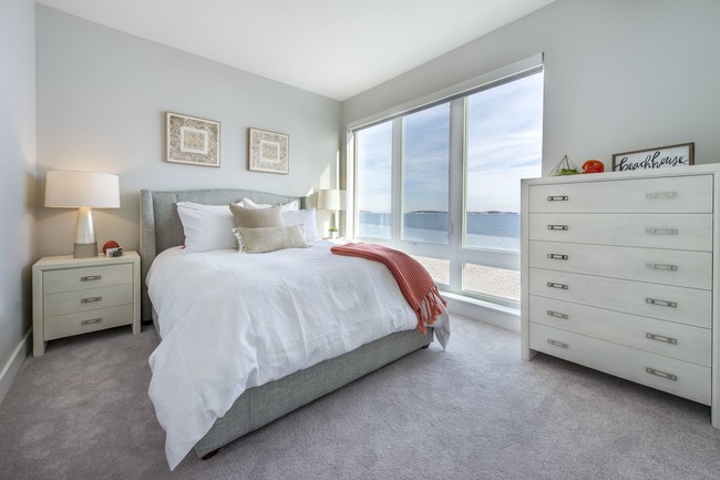 Dormitorio con vista al mar - Beach House Apartments